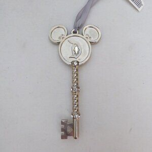 NEW DISNEY DISNEYLAND 60th ANNIVERSARY SILVER BEJEWELED METAL KEY ORNAMENT